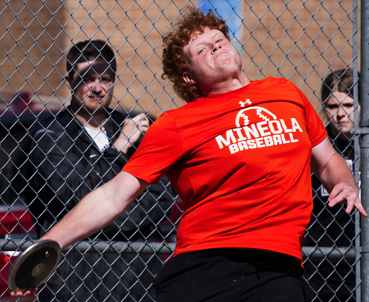 Trey Rushing's discus throw of 126'8" earned a silver medal for Mineola. [see more speed and strength on display]